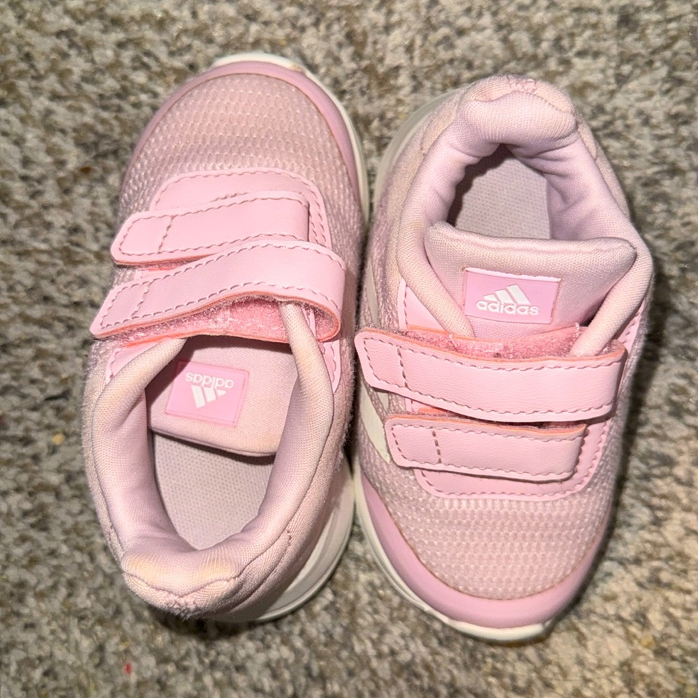 Used adidas, toddler girls size 5. Pink and white adidas.